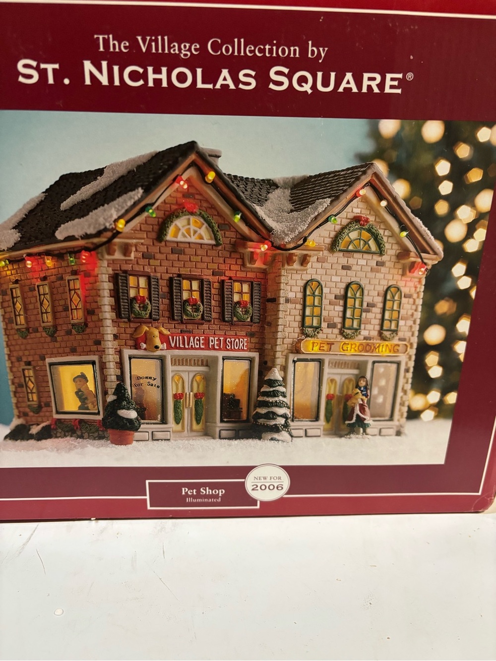 St. Nicholas Square Illuminated Village Pet Shop - Red, Green, Gold Accents